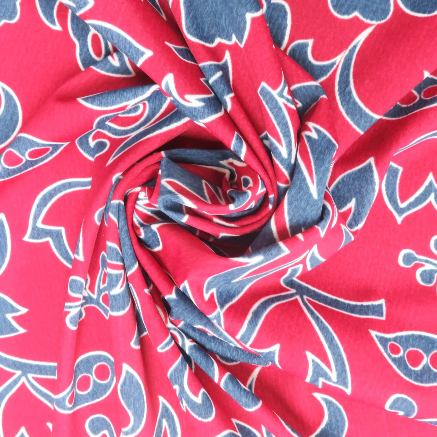 Blue Flowers on a Red Background Printed Jersey Stretch Fabric